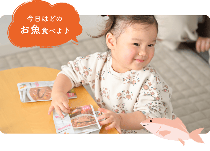 商品を選ぶ赤ちゃん